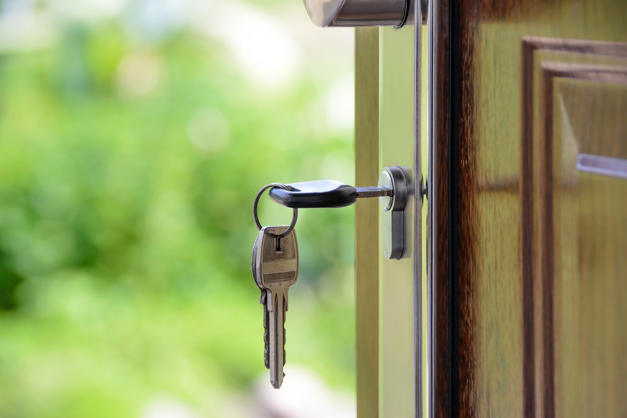 Immobilien Schlüssel in Haustür